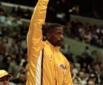 26 Nov 1999:  A. C. Green of the Los Angeles Lakers waves to the crowd during a game against the New Jersey Nets  at the Staples Center in Los Angeles, California. The Lakers defeated the Nets 103-80.   Mandatory Credit: Donald Miralle  /Allsport