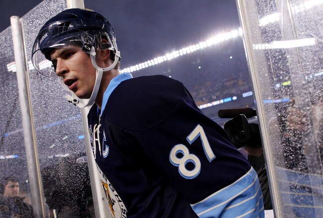 PITTSBURGH, PA - JANUARY 01:  Sidney Crosby #87 of the Pittsburgh Penguins walks off the ice after being defeated 3-1 by the Washington Capitals during the 2011 NHL Bridgestone Winter Classic at Heinz Field on January 1, 2011 in Pittsburgh, Pennsylvania.