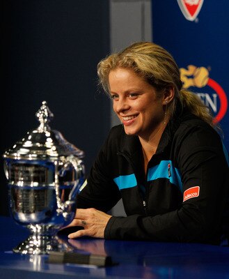 NEW YORK - SEPTEMBER 11:  Kim Clijsters of Belguim talks to the media with the trophy after defeating Vera Zvonareva of Russia during their women's singles final on day thirteen of the 2010 U.S. Open at the USTA Billie Jean King National Tennis Center on