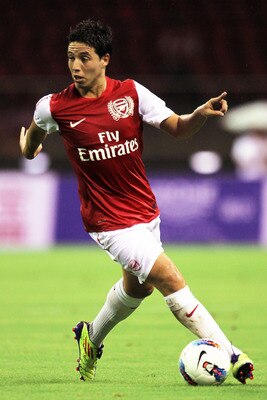 HANGZHOU, CHINA - JULY 16:  Samir Nasri of Arsenal in action during the pre-season friendly match between Hangzhou Greentown and Arsenal at Yiwu Meihu Stadium on July 16, 2011 in Hangzhou, China.  (Photo by Lintao Zhang/Getty Images)