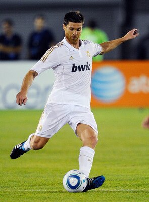 LOS ANGELES, CA - JULY 16: Xabi Alonso #14 of Real Madrid in action against Los Angeles Galaxy during the Herbalife World Challenge 2011 friendly soccer game at Los Angeles Memorial Coliseum on July 16, 2011 in Los Angeles, California.  (Photo by Kevork D