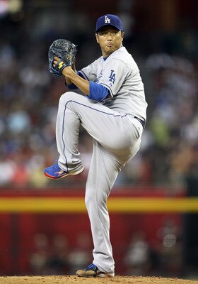 PHOENIX, AZ - JULY 16:  Starting pitcher Hiroki Kuroda #18 of the Los Angeles Dodgers pitches against the Arizona Diamondbacks during the Major League Baseball game at Chase Field on July 16, 2011 in Phoenix, Arizona. The Diamondbacks defeated the Dodgers