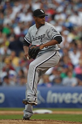 CHICAGO, IL - JULY 01:  Starting pitcher Edwin Jackson #33 of the Chicago White Sox delivers the ball against the Chicago Cubs at Wrigley Field on July 1, 2011 in Chicago, Illinois. The White Sox defeated the Cubs 6-4.  (Photo by Jonathan Daniel/Getty Ima