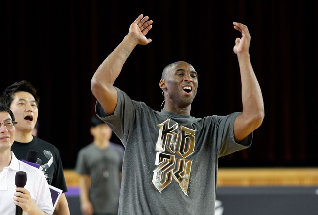 SEOUL, SOUTH KOREA - JULY 14: NBA player Kobe Bryant #24 of the Los Angeles Lakers participates in an teaching session for South Korean fans during a promotional tour of South Korea at the Korea University on July 14, 2011 in Seoul, South Korea. (Photo