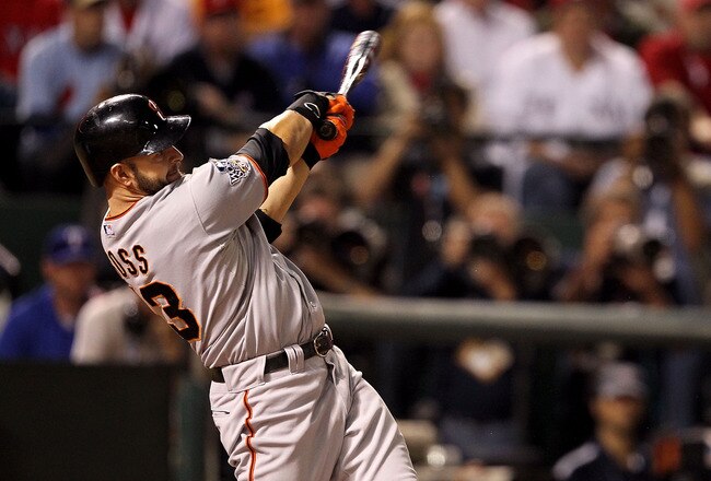 ARLINGTON, TX - NOVEMBER 01:  Cody Ross #13 of the San Francisco Giants bats against the Texas Rangers in Game Five of the 2010 MLB World Series at Rangers Ballpark in Arlington on November 1, 2010 in Arlington, Texas. The Giants won 3-1.  (Photo by Ronal