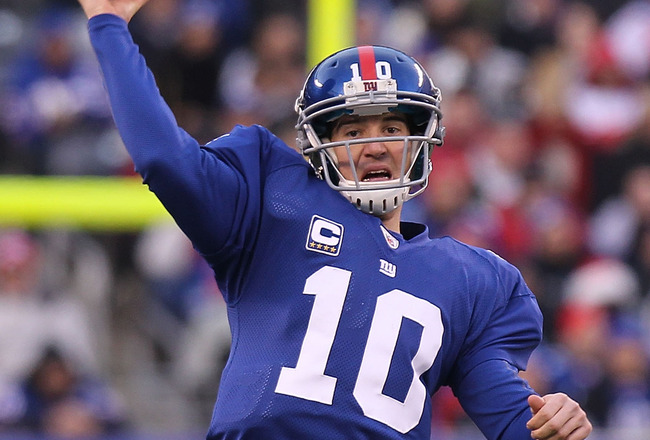 EAST RUTHERFORD, NJ - DECEMBER 19:  Eli Manning #10 of the New York Giants passes against the Philadelphia Eagles at New Meadowlands Stadium on December 19, 2010 in East Rutherford, New Jersey.  (Photo by Nick Laham/Getty Images)