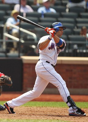 NEW YORK, NY - JULY 21:  Carlos Beltran #15 of the New York Mets flies out in the ninth inning against the St. Louis Cardinals during their game on July 21, 2011 at Citi Field in the Flushing neighborhood of the Queens borough of New York City.  (Photo by