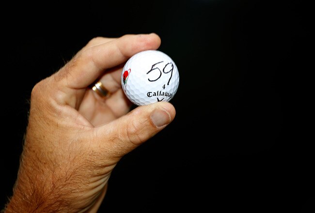 WHITE SULPHUR SPRINGS, WV - AUGUST 01:  Stuart Appleby of Australia poses with his golf ball after he finished with an 11-under par 59 during the final round of the Greenbrier Classic on The Old White Course at the Greenbrier Resort  on August 1, 2010 in