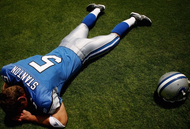 LOS ANGELES, CA - MAY 19: Quarterback, Drew Stanton #5 of the Detroit Lions lays on the field at the 2007 NFL Players Rookie Premiere on May 19, 2007 at the Los Angeles Memorial Coliseum in Los Angeles, California. (Photo by Nick Laham/Getty Images)