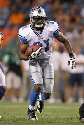 DENVER - AUGUST 21:  Running back Aaron Brown #21 of the Detroit Lions rushes against the Denver Broncos during preseason NFL action at INVESCO Field at Mile High on August 21, 2010 in Denver, Colorado. The Lions defeated the Broncos 25-20.  (Photo by Dou