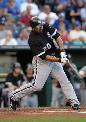 KANSAS CITY, MO - JULY 19:  Carlos Quentin #20 of the Chicago White Sox in action during the game against the Kansas City Royals on July 19, 2011 at Kauffman Stadium in Kansas City, Missouri.  (Photo by Jamie Squire/Getty Images)