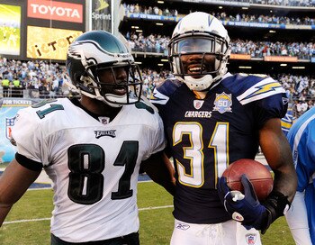 SAN DIEGO - NOVEMBER 15:  Antonio Cromartie #31 of the San Diego Chargers holds the game ball after intercepting the last pass as Jason Avant #81 of the Philadelphia Eagles congratuales him during the NFL football game at Qualcomm Stadium on November 15, 