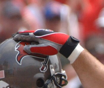 Tampa Bay Buccaneers linebacker Barrett Rudd applauds a downed kick by cornerback Juran Bolden against the Buffalo Bills September 18, 2005 in Tampa.  (Photo by Al Messerschmidt/Getty Images)