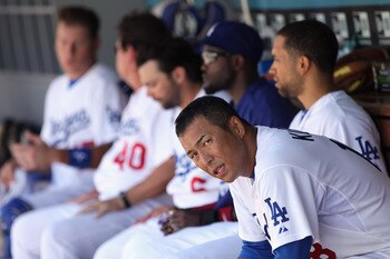 LOS ANGELES, CA - JUNE 25:  Pitcher Hiroki Kuroda #18 of the Los Angeles Dodgers looks on from the bench in the fourth inning against the Los Angeles Angels of Anaheim at Dodger Stadium on June 25, 2011 in Los Angeles, California. The Angels defeated the