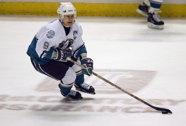 ANAHEIM, CA - APRIL 28:  Paul Kariya #9 of the Mighty Ducks of Anaheim skates with the puck against the Dallas Stars during the 2003 Western Conference Semifinals in the Stanley Cup playoffs at the Arrowhead Pond of Anaheim on April 28, 2003 in Anaheim, C