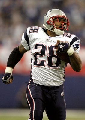 INDIANAPOLIS - JANUARY 21:  Corey Dillon #28 of the New England Patriots runs for 35 yards against the Indianapolis Colts during the AFC Championship Game on January 21, 2007 at the RCA Dome in Indianapolis, Indiana.  (Photo by Andy Lyons/Getty Images)