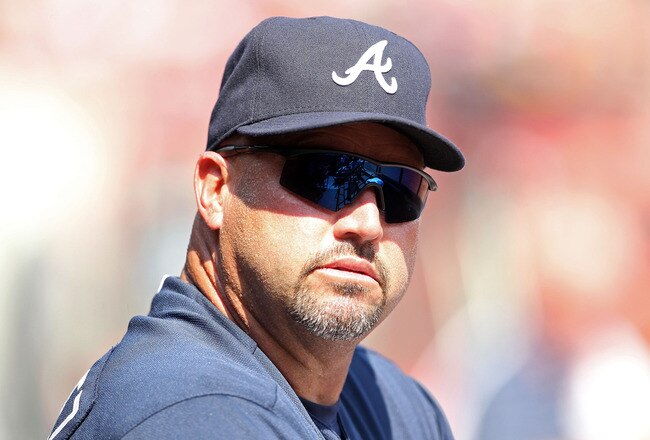 CINCINNATI, OH - JULY 23:  Fredi Gonzalez #33 the manager of the Atlanta Braves watches action during the game against the Cincinnati Reds at Great American Ball Park on July 23, 2011 in Cincinnati, Ohio.  (Photo by Andy Lyons/Getty Images)