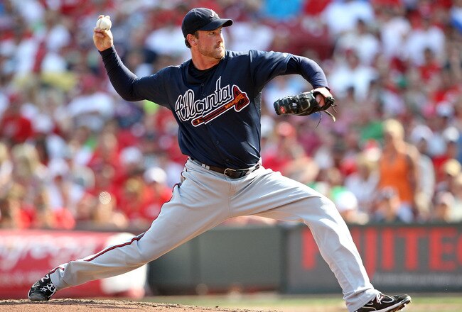 CINCINNATI, OH - JULY 23:  Derek Lowe #32 of the Atlanta Braves throws a pitch during the game against the Cincinnati Reds at Great American Ball Park on July 23, 2011 in Cincinnati, Ohio.  (Photo by Andy Lyons/Getty Images)