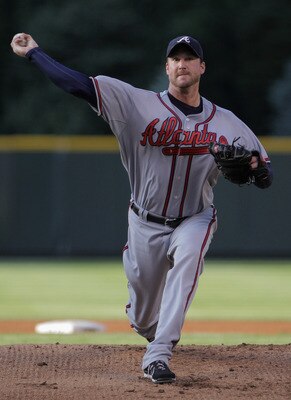 DENVER, CO - JULY 18:  Starting pitcher Derek Lowe #32 of the Atlanta Braves works against the Colorado Rockies at Coors Field on July 18, 2011 in Denver, Colorado. Lowe earned the win as the Braves defeated the Rockies 7-4.  (Photo by Doug Pensinger/Gett