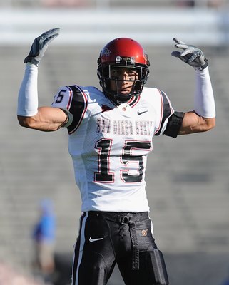 PASADENA, CA - SEPTEMBER 05:  Jose Perez #15 of the San Diego State Aztecs reacts during the game against the UCLA Bruins at The Rose Bowl on September 5, 2009 in Pasadena, California.  (Photo by Lisa Blumenfeld/Getty Images)