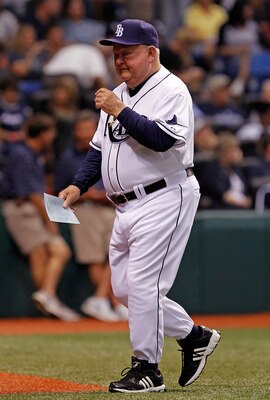 ST. PETERSBURG - SEPTEMBER 13:  Don Zimmer #62 of the Tampa Bay Rays delivers the lineup card to the umpires just prior to the start of the game against the New York Yankees at Tropicana Field on September 13, 2010 in St. Petersburg, Florida.  (Photo by J