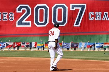 BOSTON - APRIL 08: David Ortiz #34 of the Boston Red Sox heads out on to the field to get his 2007 World Series Championship ring before the game the Detroit Tigers on April 8,2008 during Opening Day at Fenway Park in Boston, Massachusetts. (Photo by Elsa