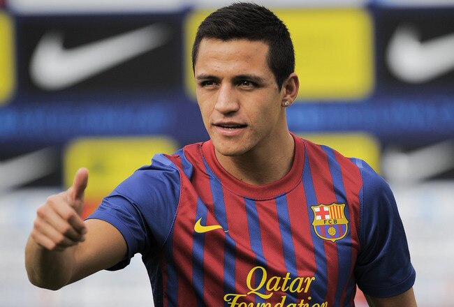 BARCELONA, SPAIN - JULY 25:  Alexis Sanchez from Chile poses during his presentation as the new signing for FC Barcelona at the Joan Gamper training camp sports complex on July 25, 2011 in Barcelona, Spain.  (Photo by David Ramos/Getty Images)