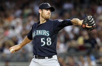 NEW YORK, NY - JULY 26:  Doug Fister #58 of the Seattle Mariners pitches against the New York Yankees on July 26, 2011 at Yankee Stadium in the Bronx borough of New York City.  (Photo by Jim McIsaac/Getty Images)