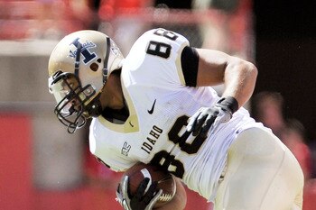 LINCOLN, NEBRASKA - SEPTEMBER 11: Nebraska Cornhuskers defensive back DeJon Gomes #7 trips up Idaho Vandals wide receiver Daniel Hardy #88 during second half action of their game at Memorial Stadium on September 4, 2010 in Lincoln, Nebraska. Nebraska defe