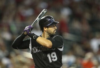 PHOENIX, AZ - JULY 24:  Ryan Spilborghs #19 of the Colorado Rockies bats against the Arizona Diamondbacks during the Major League Baseball game at Chase Field on July 24, 2011 in Phoenix, Arizona.  The Diamondbacks defeated the Rockies 7-0.  (Photo by Chr