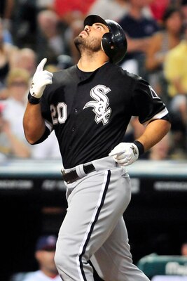 CLEVELAND, OH - JULY 22: Carlos Quentin #20 of the Chicago White Sox looks to the sky after hitting a three run home run during the fifth inning against the Cleveland Indians at Progressive Field on July 22, 2011 in Cleveland, Ohio. (Photo by Jason Miller