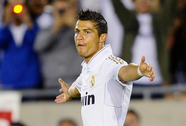 LOS ANGELES, CA - JULY 16:  Cristiano Ronaldo #7 of Real Madrid celebrates his goal against  Los Angeles Galaxy during the Herbalife World Challenge 2011 friendly soccer game at Los Angeles Memorial Coliseum on July 16, 2011 in Los Angeles, California.  (