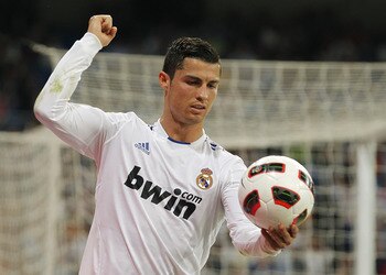 MADRID, SPAIN - MAY 10: Cristiano Ronaldo of Real Madrid holds the ball during the La Liga match between Real Madrid and Getafe at Estadio Santiago Bernabeu on May 10, 2011 in Madrid, Spain. (Photo by Angel Martinez/Getty Images)