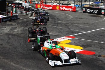 MONTE CARLO, MONACO - MAY 29:  Adrian Sutil of Germany and Force India leads a train of cars through the swimming pool complex during the Monaco Formula One Grand Prix at the Monte Carlo Circuit on May 29, 2011 in Monte Carlo, Monaco.  (Photo by Mark Thom