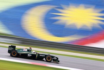 KUALA LUMPUR, MALAYSIA - APRIL 03:  Jarno Trulli of Italy and Lotus drives during qualifying for the Malaysian Formula One Grand Prix at the Sepang Circuit on April 3, 2010 in Kuala Lumpur, Malaysia.  (Photo by Paul Gilham/Getty Images)