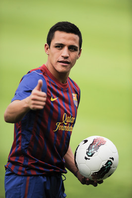 BARCELONA, SPAIN - JULY 25: Alexis Sanchez from Chile poses during his presentation as the new signing for FC Barcelona, at the Joan Gamper training camp sports complex on July 25, 2011 in Barcelona, Spain. (Photo by David Ramos/Getty Images)