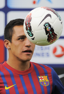 BARCELONA, SPAIN - JULY 25: Alexis Sanchez from Chile controls the ball during his presentation as the new signing for FC Barcelona at the Joan Gamper training camp sports complex on July 25, 2011 in Barcelona, Spain. (Photo by David Ramos/Getty Images)