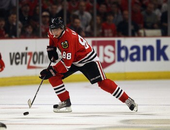 CHICAGO, IL - APRIL 10: Patrick Kane #88 of the Chicago Blackhawks controls the puck against the Detroit Red Wings at the United Center on April 10, 2011 in Chicago, Illinois. The Red Wings defeated the Blackhawks 4-3. (Photo by Jonathan Daniel/Getty Imag
