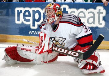 MANCHESTER, NH - FEBRUARY 13:  Goalie Joey MacDonald #31 of the Grand Rapids Griffins streches before the rapid fire event at the American Hockey League All Star Skills Competition on February 13, 2005 at Verizon Wireless Arena in Manchester, New Hampshir