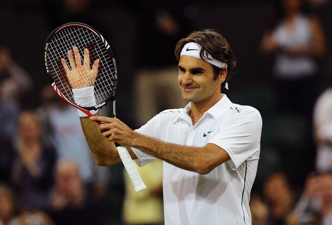 LONDON, ENGLAND - JUNE 23:  Roger Federer of Switzerland reacts after winning his second round match against Adrian Mannarino of France on Day Four of the Wimbledon Lawn Tennis Championships at the All England Lawn Tennis and Croquet Club on June 23, 2011