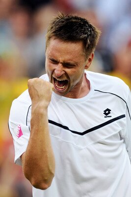 LONDON, ENGLAND - JUNE 23:  Robin Soderling of Sweden celebrates victory during his second round match against Lleyton Hewitt of Australia on Day Four of the Wimbledon Lawn Tennis Championships at the All England Lawn Tennis and Croquet Club on June 23, 2
