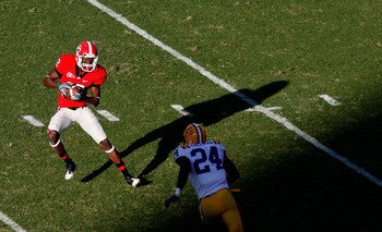 ATHENS, GA - OCTOBER 03: Tavarres King #12 of the Georgia Bulldogs pulls in a reception against Harry Coleman #24 of the Louisiana State University Tigers at Sanford Stadium on October 3, 2009 in Athens, Georgia. (Photo by Kevin C. Cox/Getty Images)
