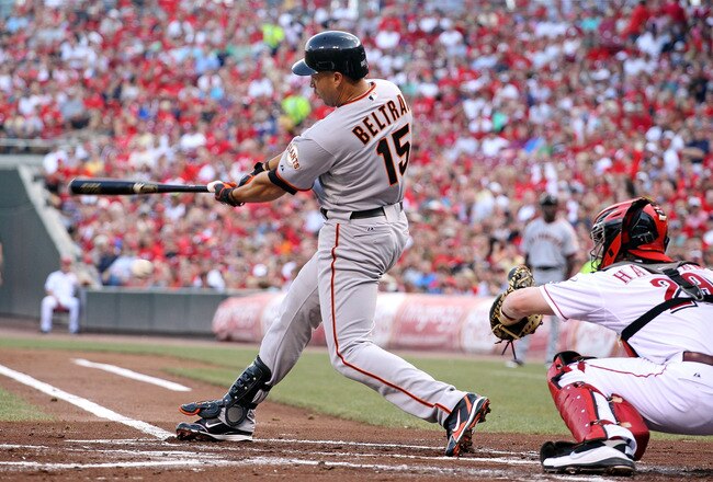 CINCINNATI, OH - JULY 30:  Carlos Beltran #15 of the San Francisco swings at a pitch during the game against the Cincinnati Reds at Great American Ball Park on July 30, 2011 in Cincinnati, Ohio.  (Photo by Andy Lyons/Getty Images)