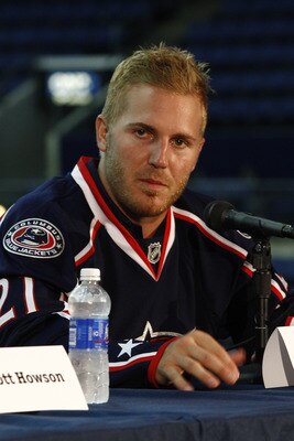 COLUMBUS,OH - JULY 21:  James Wisniewski #21 of the Columbus Blue Jackets speaks during a press conference on July 21, 2011 at Nationwide Arena in Columbus, Ohio.  (Photo by John Grieshop/Getty Images)