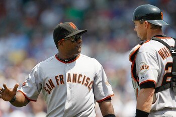 CHICAGO, IL - JUNE 30: Eli Whiteside #22 of the San Francisco Giants talks with Miguel Tejada #10 during a game against the Chicago Cubs at Wrigley Field on June 30, 2011 in Chicago, Illinois. (Photo by Scott Boehm/Getty Images)