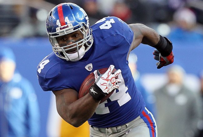 EAST RUTHERFORD, NJ - DECEMBER 05:  Ahmad Bradshaw #44 of the New York Giants runs the ball against the Washington Redskins on December 5, 2010 at the New Meadowlands Stadium in East Rutherford, New Jersey. The Giants defeated the Redskins 31-7.  (Photo b