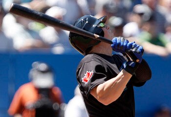 TORONTO, CANADA - JULY 30:  Colby Rasmus #28 of the Toronto Blue Jays flies out during MLB action at the Rogers Centre July 30, 2011 in Toronto, Ontario, Canada. (Photo by Abelimages/Getty Images)