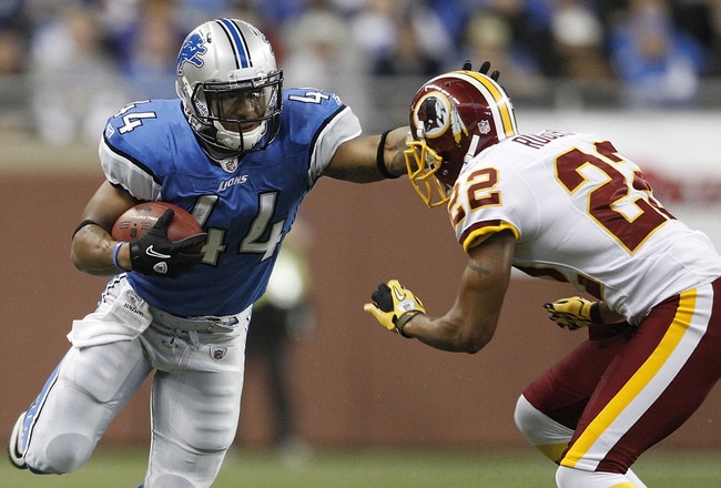 DETROIT - OCTOBER 31: Jahvid Best #44 of the Detroit Lions runs for a first down as Carlos Rogers #22 of the Washington Redskins gets ready to make the stop during the first quarter of the game at Ford Field on October 31, 2010 in Detroit, Michigan. (Phot
