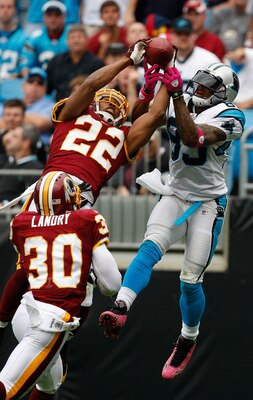 CHARLOTTE, NC - OCTOBER 11:  Steve Smith #89 of the Carolina Panthers has a pass broken up by Carlos Rogers #22 of the Washington Redskins at Bank of America Stadium on October 11, 2009 in Charlotte, North Carolina.  (Photo by Streeter Lecka/Getty Images)