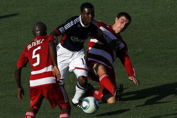 FRISCO, TX - JULY 31:  Michael Lahoud #11 of the Chivas USA dribbles the ball against Bobby Warshaw #16 and Jair Benitez #5 of the FC Dallas at Pizza Hut Park on July 31, 2011 in Frisco, Texas.  (Photo by Ronald Martinez/Getty Images)